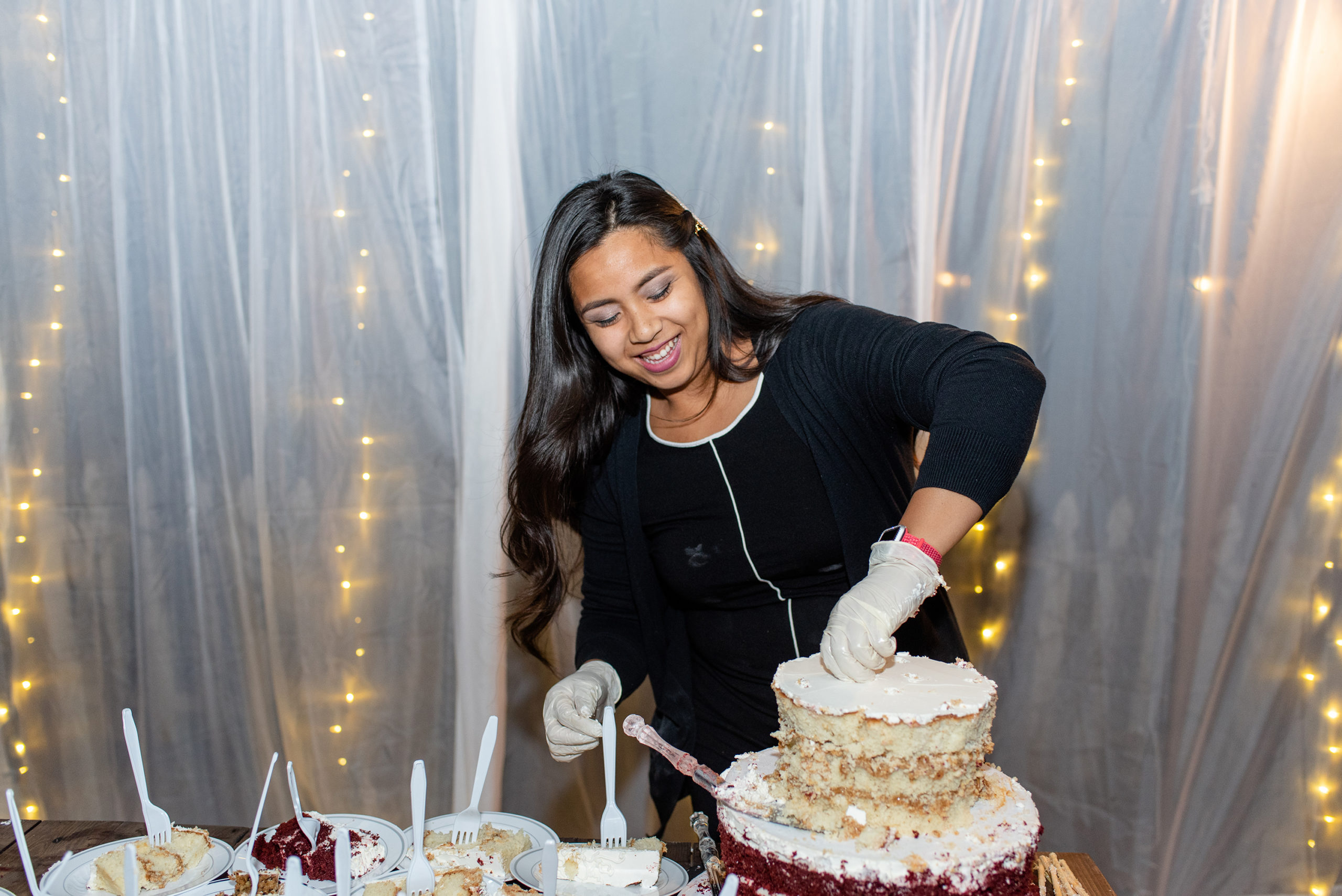 miranda madison events helping cut wedding cake
